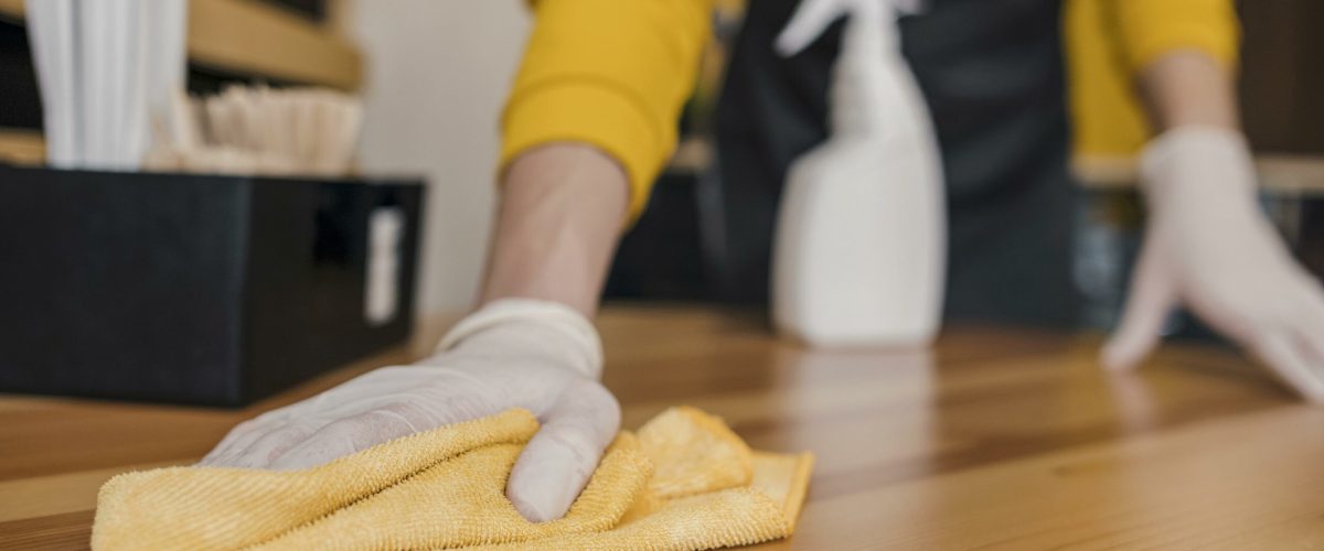 front-view-barista-cleaning-table (1)